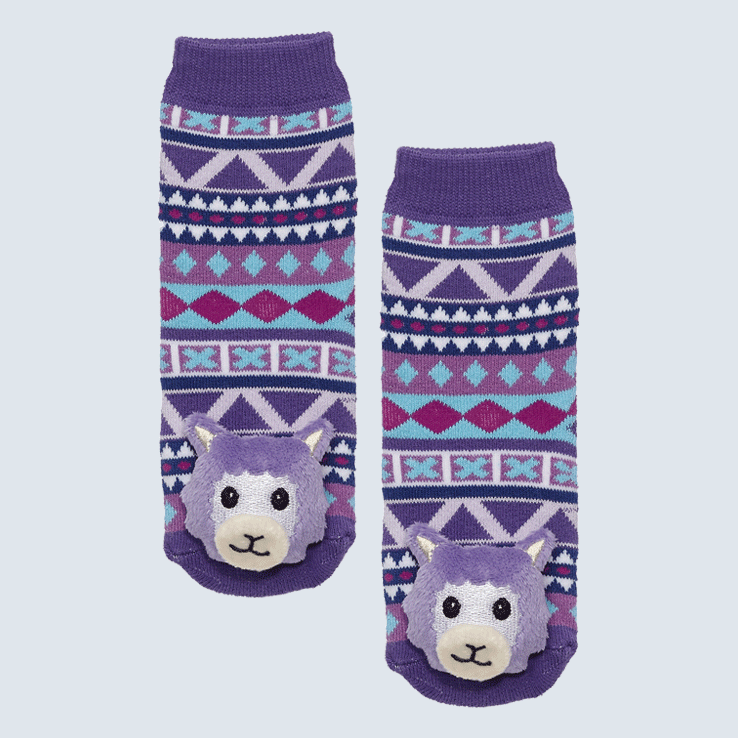 Two socks against a white background. The socks feature a purple diamond motif a cute plush llama charm on the toe.