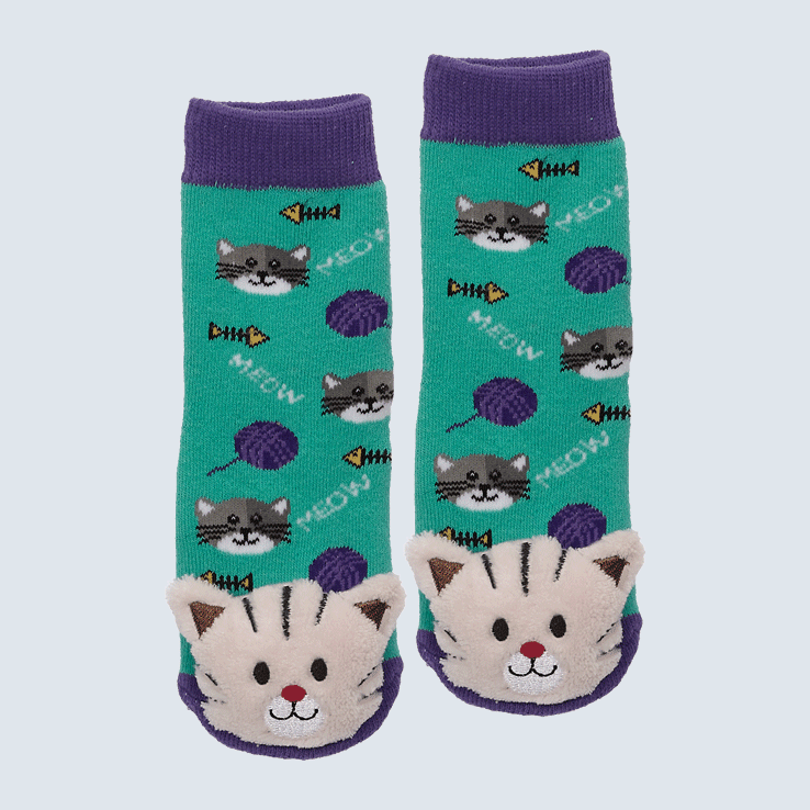 Two socks against a white background. The socks feature a cat face, balls of yarn, and "meow" text motify.  And, there's a cute plush kitten charm on the toe.